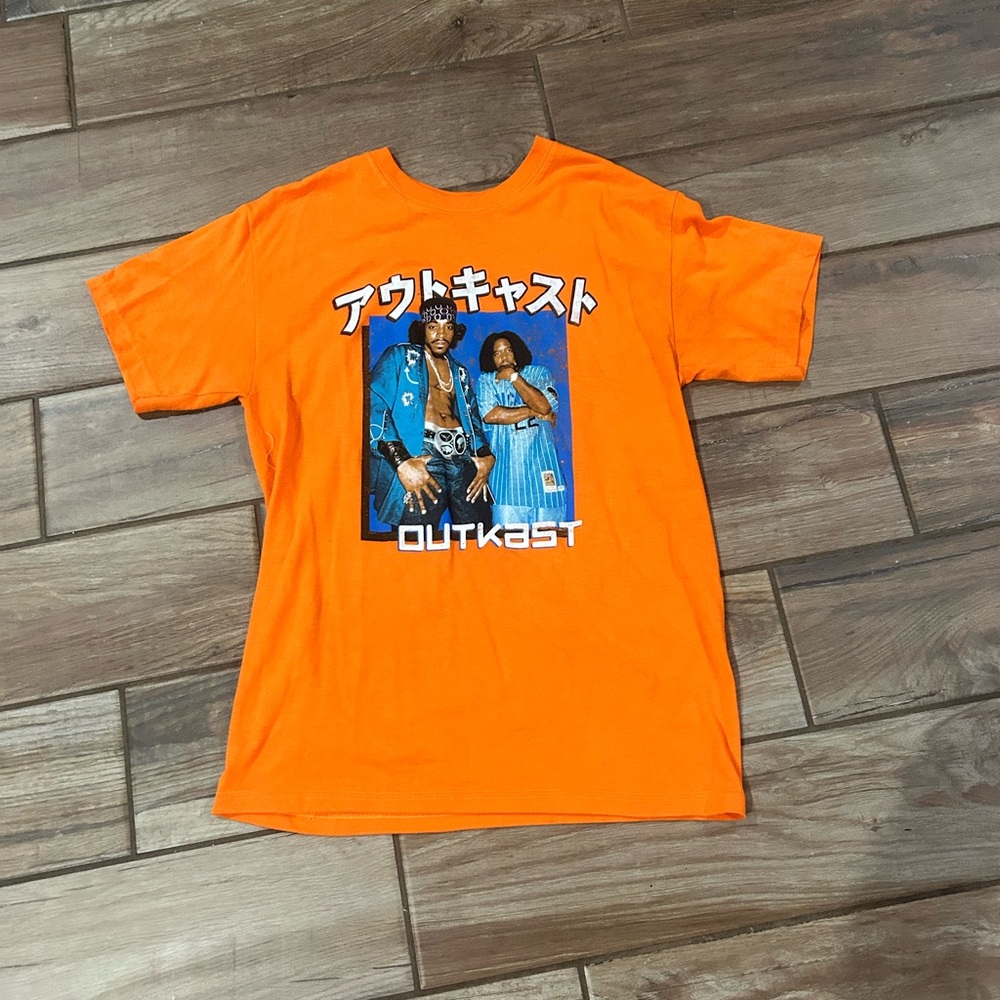 Orange outcast tee shirt